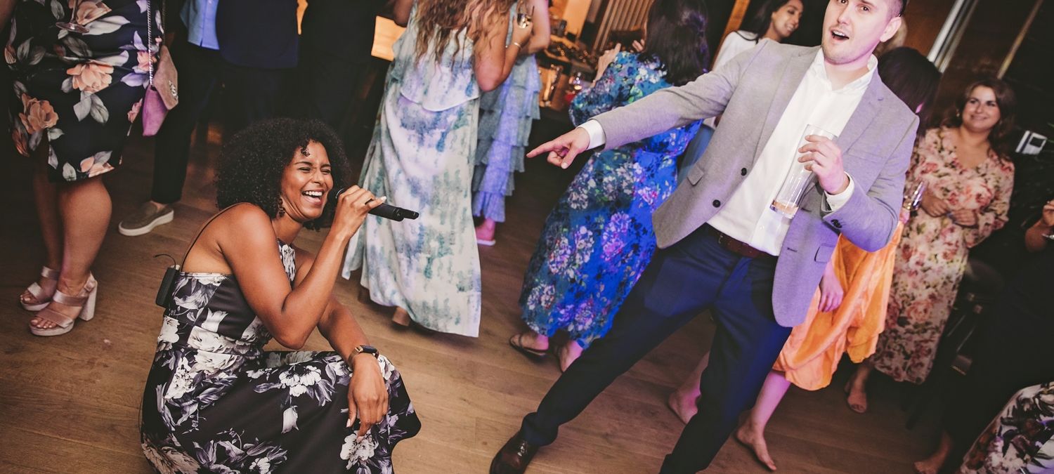 AKA As singer on the dancefloor - band live wedding - Live Wedding Band | Surrey wedding entertainment | live band for wedding | Live band for wedding reception | AKA Party Band