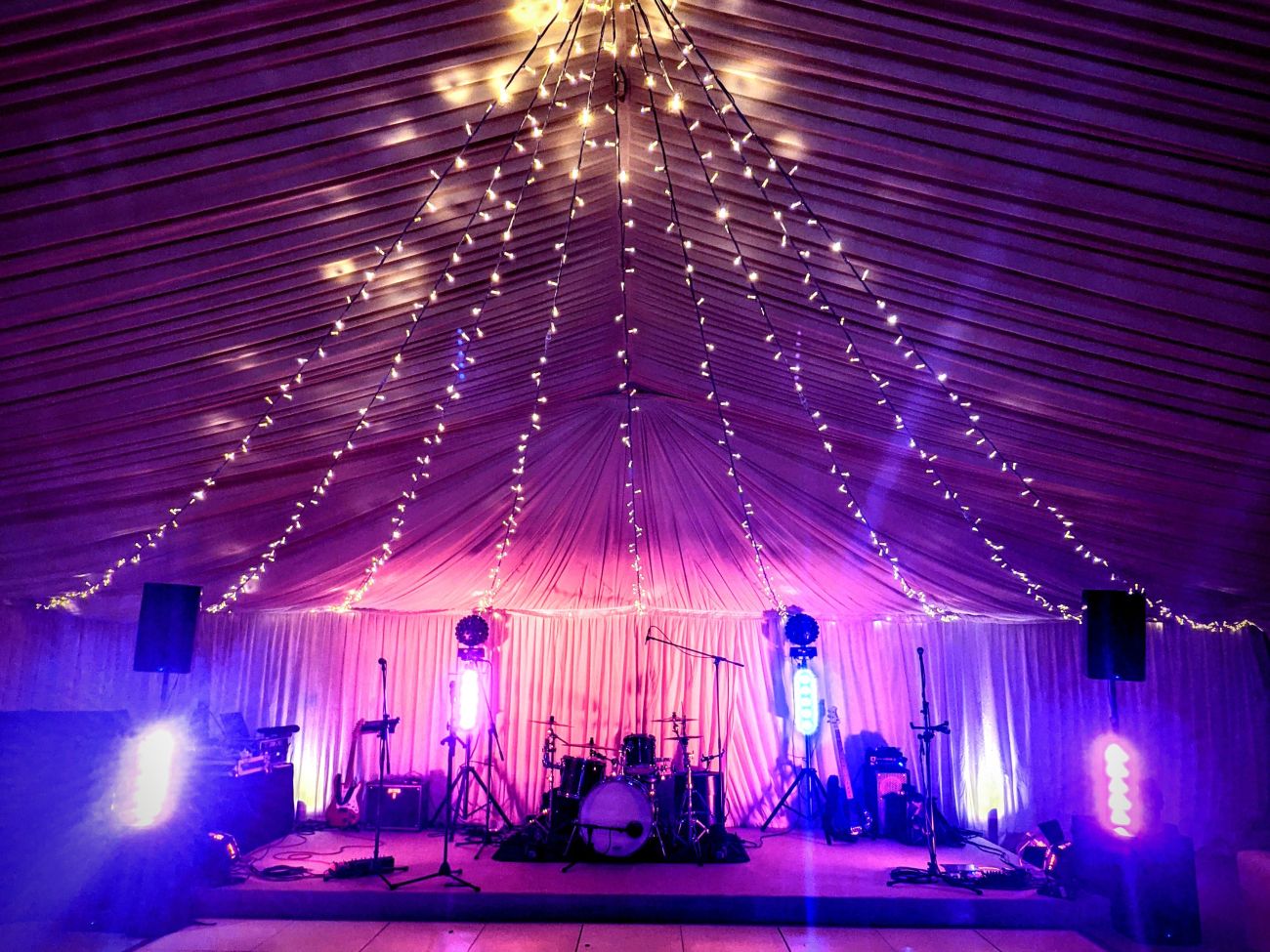 AKA wedding band set up at private marquee with fairy lights - Live Wedding Band | Hire a wedding band | live wedding bands | Live music wedding bands | best wedding live bands | AKA Party Band