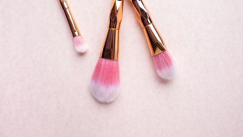 gold make up brushes with blusher - Live Wedding Band | wedding band | live music band for wedding | band live wedding | wedding live band price | AKA Party Band