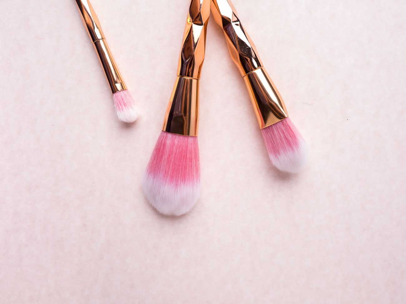 gold make up brushes with blusher - Live Wedding Band | wedding band | live music band for wedding | band live wedding | wedding live band price | AKA Party Band
