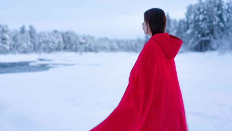 Bride in red cape, perfect for a Winter Wedding - Live Wedding Band | Surrey wedding entertainment | live band for wedding | Live band for wedding reception | AKA Party Band