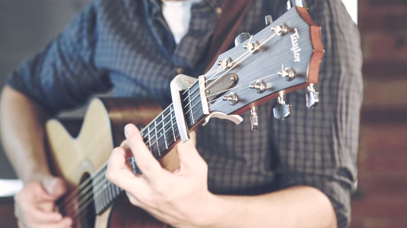 Playing Guitar at Watts Gallery in Surrey - Live Wedding Band | Hire a wedding band | live wedding bands | Live music wedding bands | best wedding live bands | AKA Party Band