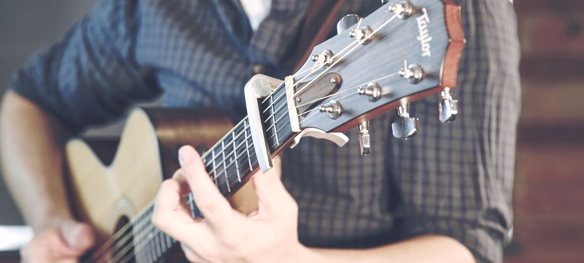 Playing Guitar at Watts Gallery in Surrey - Live Wedding Band | Hire a wedding band | live wedding bands | Live music wedding bands | best wedding live bands | AKA Party Band