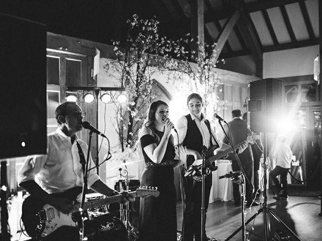 Black and White Photo of AKA performing best wedding live band - Live Wedding Band | Surrey wedding entertainment | live band for wedding | Live band for wedding reception | AKA Party Band